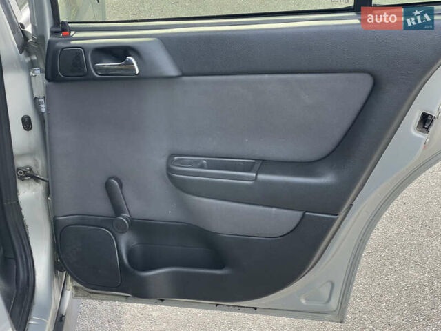 Серый Опель Астра, объемом двигателя 1.36 л и пробегом 77 тыс. км за 3999 $, фото 43 на Automoto.ua