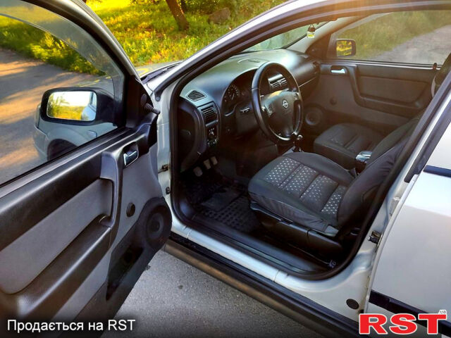 Серый Опель Астра, объемом двигателя 1.4 л и пробегом 198 тыс. км за 3500 $, фото 8 на Automoto.ua