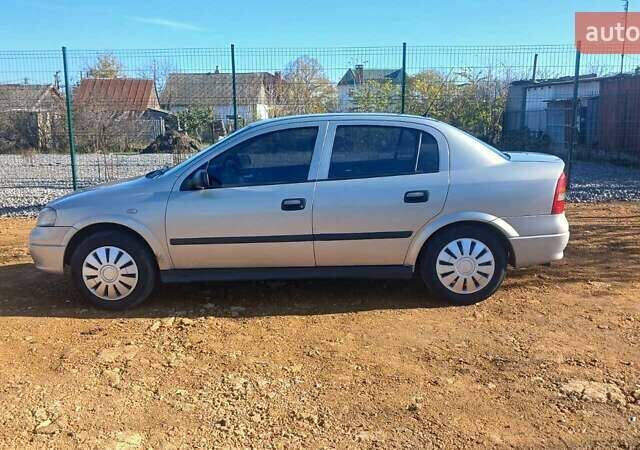 Серый Опель Астра, объемом двигателя 1.4 л и пробегом 400 тыс. км за 2300 $, фото 8 на Automoto.ua