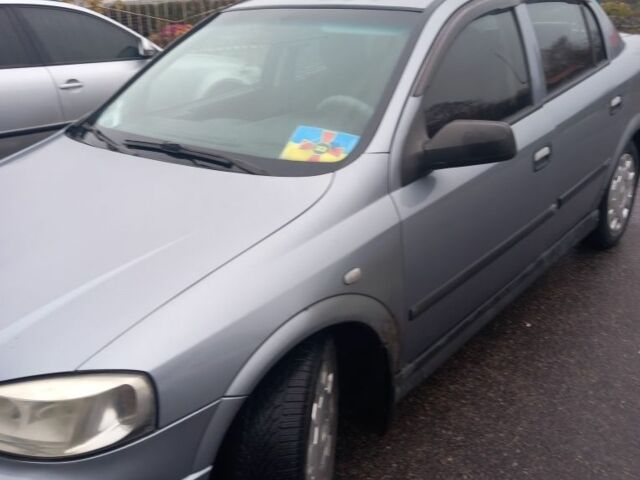 Серый Опель Астра, объемом двигателя 1.4 л и пробегом 256 тыс. км за 3200 $, фото 3 на Automoto.ua