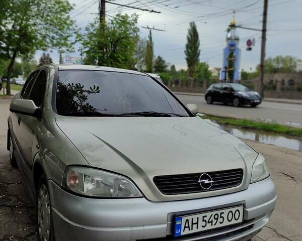 Серый Опель Астра, объемом двигателя 1.4 л и пробегом 210 тыс. км за 3100 $, фото 7 на Automoto.ua