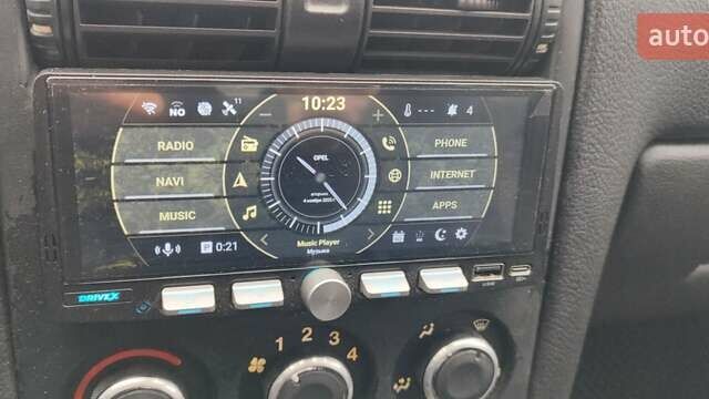 Серый Опель Астра, объемом двигателя 1.4 л и пробегом 156 тыс. км за 4500 $, фото 55 на Automoto.ua