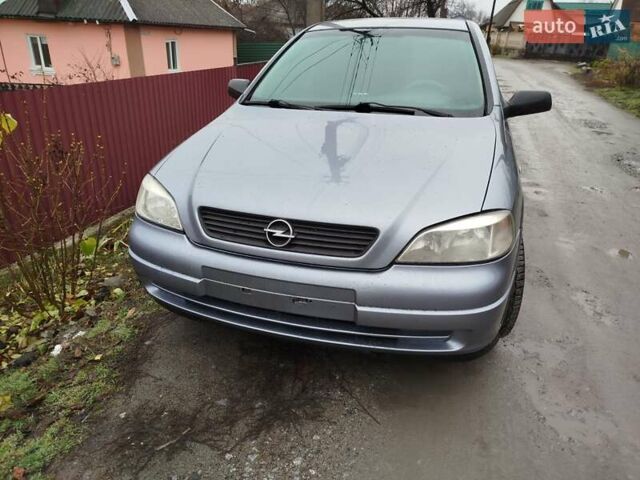 Серый Опель Астра, объемом двигателя 1.4 л и пробегом 197 тыс. км за 3350 $, фото 1 на Automoto.ua