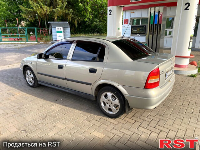 Серый Опель Астра, объемом двигателя 1.4 л и пробегом 200 тыс. км за 3500 $, фото 3 на Automoto.ua