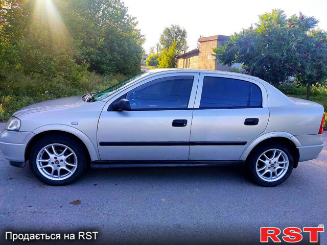 Серый Опель Астра, объемом двигателя 1.4 л и пробегом 198 тыс. км за 3500 $, фото 1 на Automoto.ua