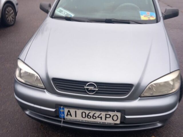 Серый Опель Астра, объемом двигателя 1.4 л и пробегом 256 тыс. км за 3200 $, фото 4 на Automoto.ua