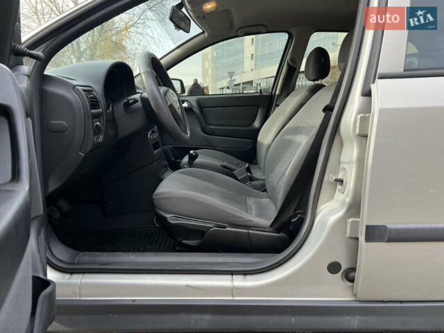 Серый Опель Астра, объемом двигателя 1.36 л и пробегом 77 тыс. км за 3999 $, фото 29 на Automoto.ua