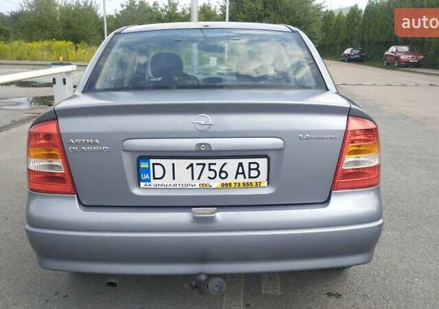 Серый Опель Астра, объемом двигателя 1.39 л и пробегом 145 тыс. км за 3900 $, фото 2 на Automoto.ua