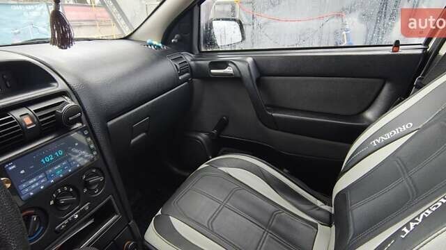 Сірий Опель Астра, об'ємом двигуна 1.4 л та пробігом 205 тис. км за 4840 $, фото 20 на Automoto.ua