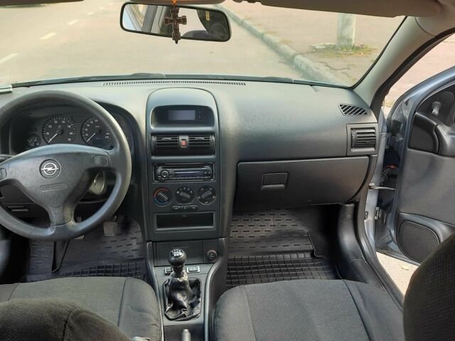 Серый Опель Астра, объемом двигателя 1.4 л и пробегом 282 тыс. км за 3700 $, фото 13 на Automoto.ua