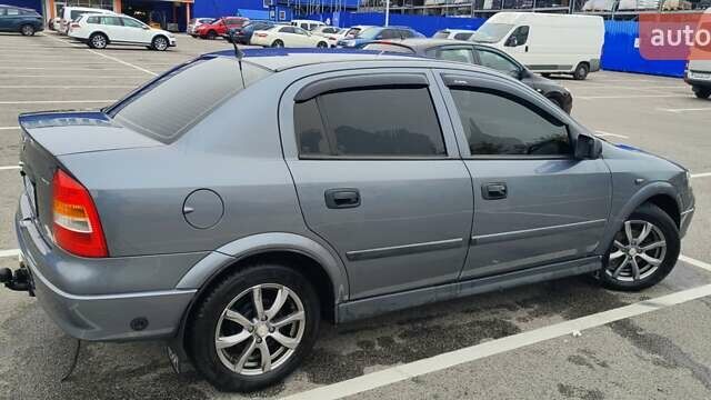 Серый Опель Астра, объемом двигателя 1.4 л и пробегом 156 тыс. км за 4500 $, фото 7 на Automoto.ua