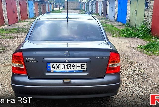 Серый Опель Астра, объемом двигателя 1.4 л и пробегом 129 тыс. км за 4750 $, фото 1 на Automoto.ua