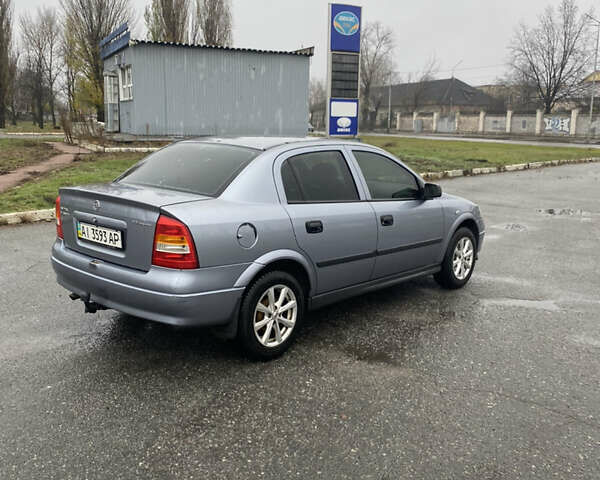 Серый Опель Астра, объемом двигателя 1.4 л и пробегом 283 тыс. км за 3200 $, фото 8 на Automoto.ua