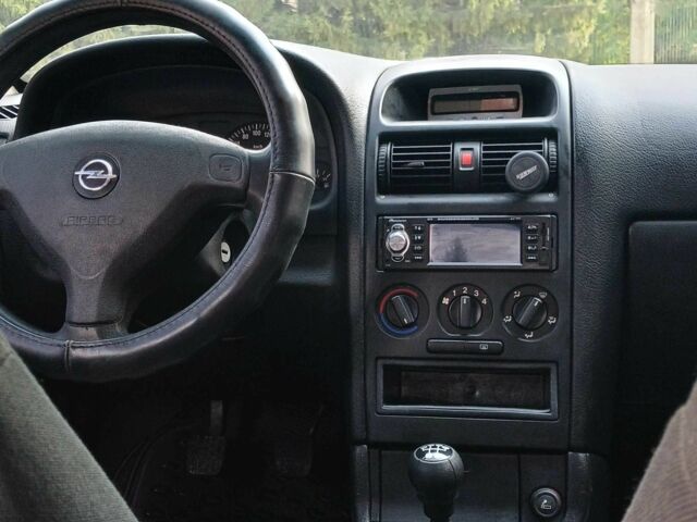 Серый Опель Астра, объемом двигателя 1.4 л и пробегом 260 тыс. км за 3590 $, фото 10 на Automoto.ua