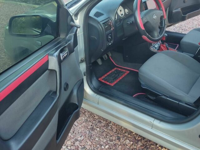 Серый Опель Астра, объемом двигателя 1.4 л и пробегом 338 тыс. км за 4100 $, фото 8 на Automoto.ua