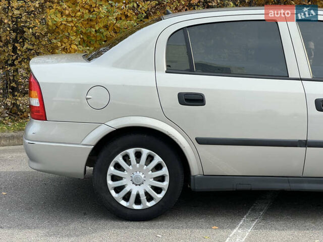 Серый Опель Астра, объемом двигателя 1.36 л и пробегом 77 тыс. км за 3999 $, фото 24 на Automoto.ua