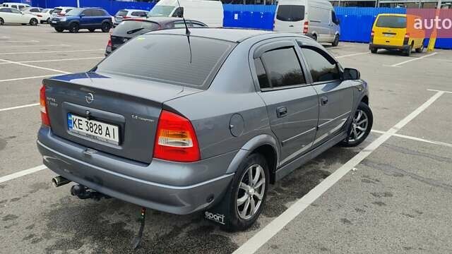 Серый Опель Астра, объемом двигателя 1.4 л и пробегом 156 тыс. км за 4500 $, фото 13 на Automoto.ua