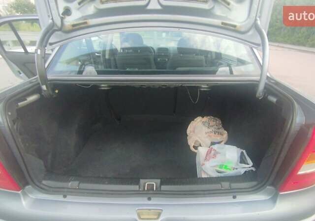 Серый Опель Астра, объемом двигателя 1.39 л и пробегом 145 тыс. км за 3900 $, фото 5 на Automoto.ua