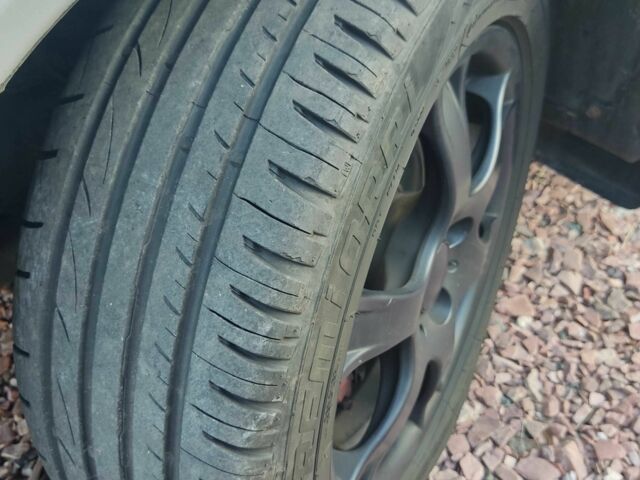 Серый Опель Астра, объемом двигателя 1.4 л и пробегом 338 тыс. км за 4100 $, фото 10 на Automoto.ua