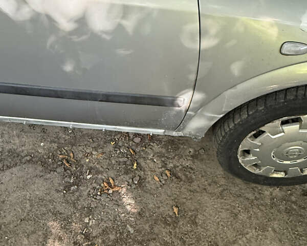 Сірий Опель Астра, об'ємом двигуна 1.39 л та пробігом 346 тис. км за 2950 $, фото 7 на Automoto.ua