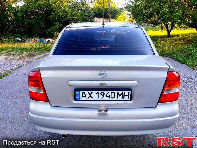 Серый Опель Астра, объемом двигателя 1.4 л и пробегом 198 тыс. км за 3500 $, фото 5 на Automoto.ua