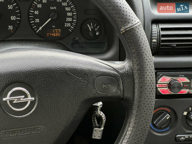 Серый Опель Астра, объемом двигателя 1.36 л и пробегом 77 тыс. км за 3999 $, фото 35 на Automoto.ua