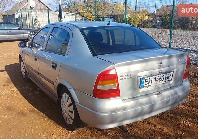 Серый Опель Астра, объемом двигателя 1.4 л и пробегом 400 тыс. км за 2300 $, фото 3 на Automoto.ua