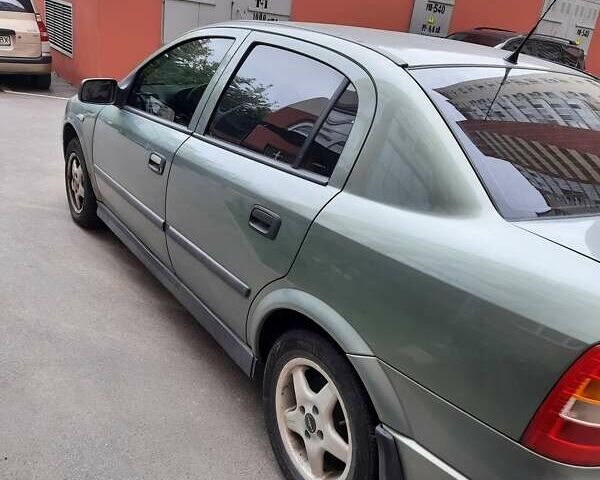 Серый Опель Астра, объемом двигателя 1.4 л и пробегом 190 тыс. км за 4000 $, фото 3 на Automoto.ua