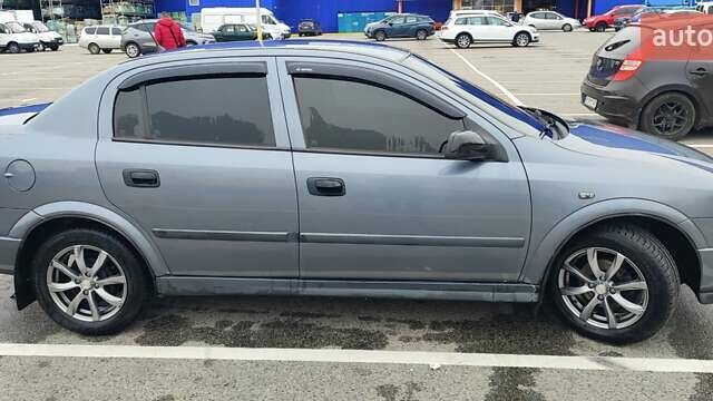 Серый Опель Астра, объемом двигателя 1.4 л и пробегом 156 тыс. км за 4500 $, фото 6 на Automoto.ua