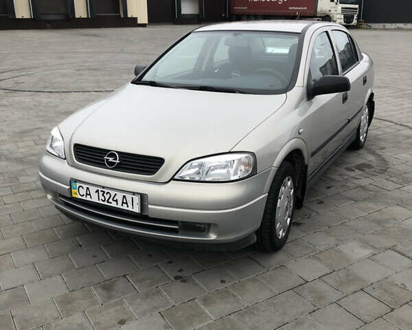 Серый Опель Астра, объемом двигателя 1.39 л и пробегом 112 тыс. км за 5500 $, фото 1 на Automoto.ua