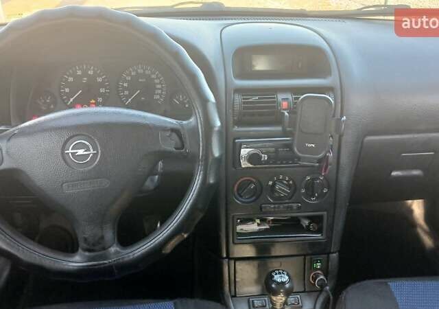 Серый Опель Астра, объемом двигателя 1.4 л и пробегом 400 тыс. км за 2300 $, фото 7 на Automoto.ua