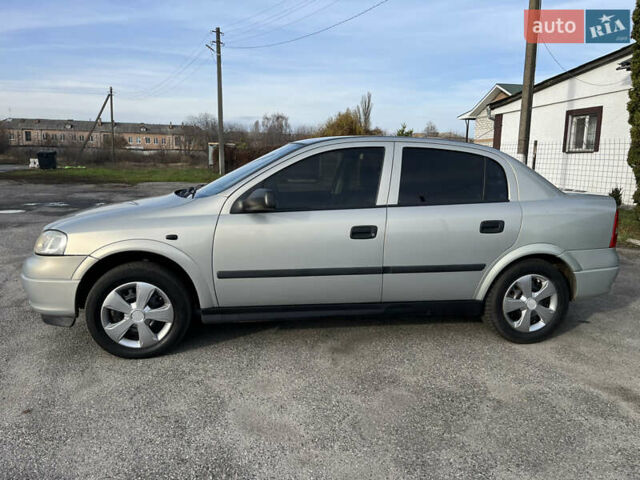 Серый Опель Астра, объемом двигателя 1.39 л и пробегом 230 тыс. км за 3700 $, фото 4 на Automoto.ua