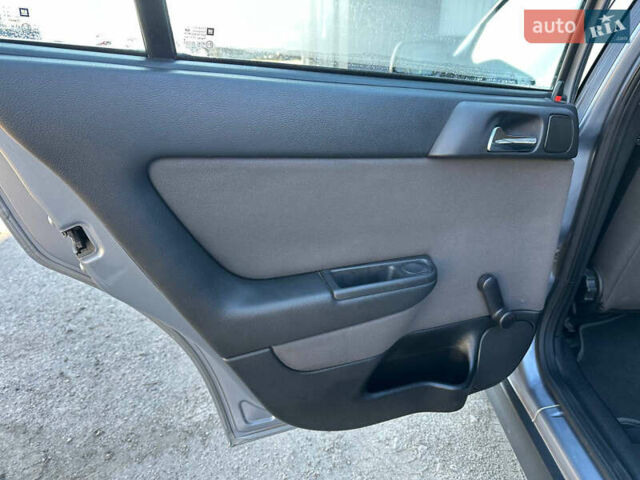 Серый Опель Астра, объемом двигателя 1.4 л и пробегом 116 тыс. км за 4699 $, фото 32 на Automoto.ua