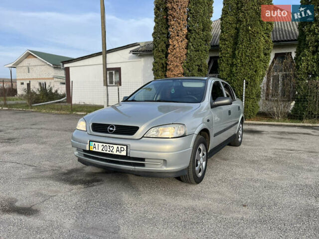 Серый Опель Астра, объемом двигателя 1.39 л и пробегом 230 тыс. км за 3700 $, фото 1 на Automoto.ua