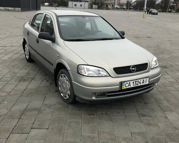 Серый Опель Астра, объемом двигателя 1.39 л и пробегом 112 тыс. км за 5500 $, фото 2 на Automoto.ua