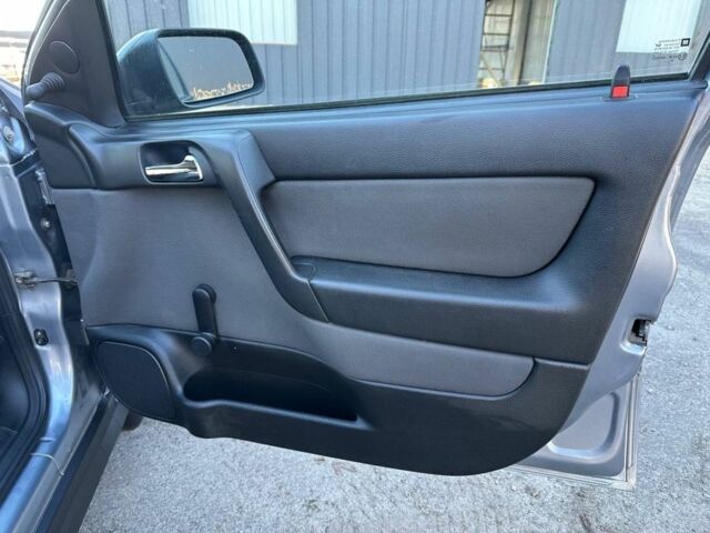 Серый Опель Астра, объемом двигателя 1.4 л и пробегом 116 тыс. км за 4699 $, фото 15 на Automoto.ua