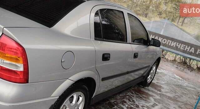 Серый Опель Астра, объемом двигателя 1.36 л и пробегом 362 тыс. км за 3900 $, фото 9 на Automoto.ua