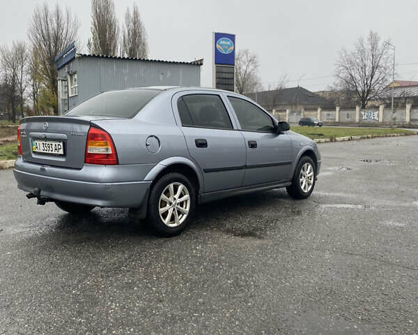 Серый Опель Астра, объемом двигателя 1.4 л и пробегом 283 тыс. км за 3200 $, фото 7 на Automoto.ua