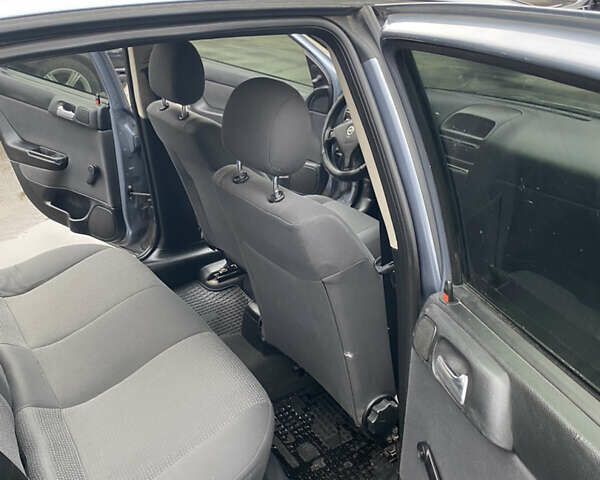 Серый Опель Астра, объемом двигателя 1.4 л и пробегом 283 тыс. км за 3200 $, фото 14 на Automoto.ua