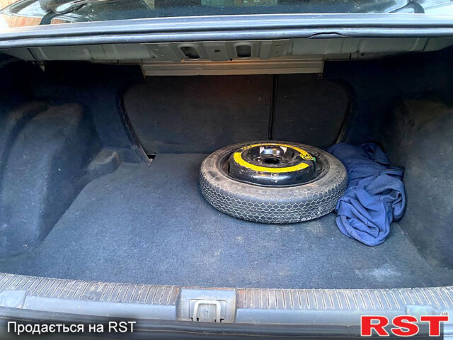 Серый Опель Астра, объемом двигателя 1.4 л и пробегом 200 тыс. км за 3500 $, фото 8 на Automoto.ua