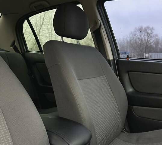 Серый Опель Астра, объемом двигателя 1.4 л и пробегом 185 тыс. км за 4500 $, фото 6 на Automoto.ua