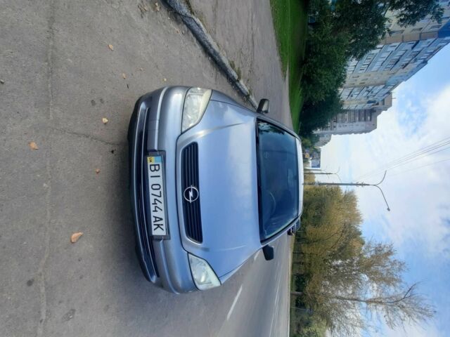 Серый Опель Астра, объемом двигателя 1.4 л и пробегом 282 тыс. км за 3700 $, фото 4 на Automoto.ua