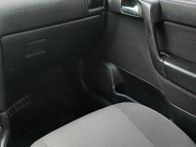 Серый Опель Астра, объемом двигателя 1.4 л и пробегом 260 тыс. км за 3590 $, фото 14 на Automoto.ua