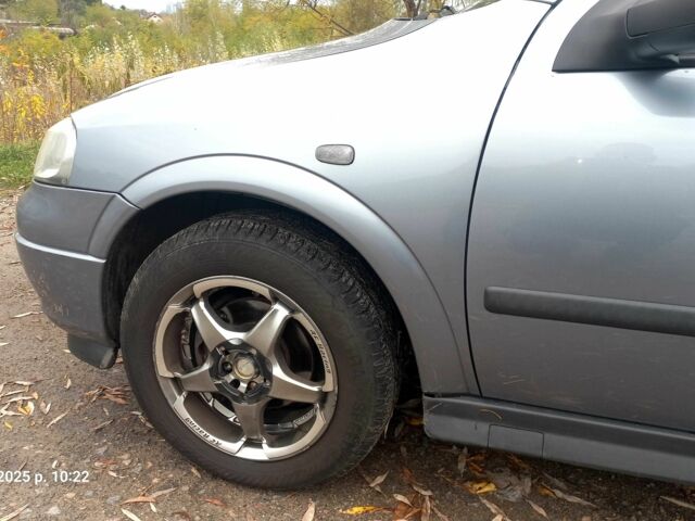 Серый Опель Астра, объемом двигателя 1.4 л и пробегом 212 тыс. км за 4200 $, фото 1 на Automoto.ua