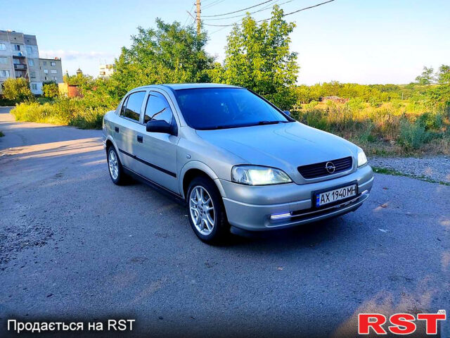 Серый Опель Астра, объемом двигателя 1.4 л и пробегом 198 тыс. км за 3500 $, фото 4 на Automoto.ua