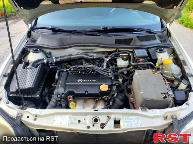 Серый Опель Астра, объемом двигателя 1.4 л и пробегом 198 тыс. км за 3500 $, фото 6 на Automoto.ua