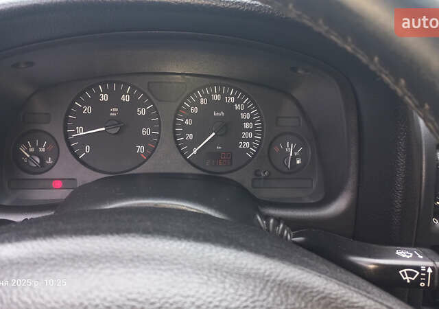 Серый Опель Астра, объемом двигателя 1.4 л и пробегом 212 тыс. км за 3900 $, фото 7 на Automoto.ua