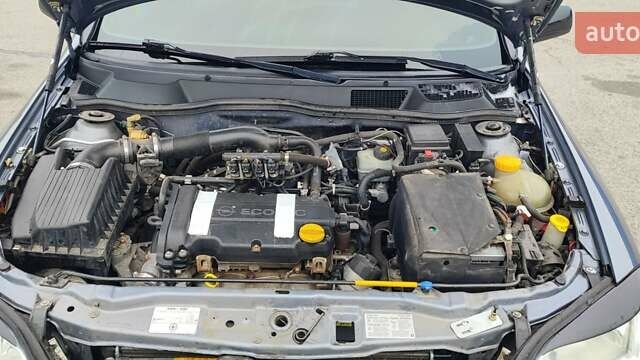 Серый Опель Астра, объемом двигателя 1.4 л и пробегом 156 тыс. км за 4500 $, фото 29 на Automoto.ua