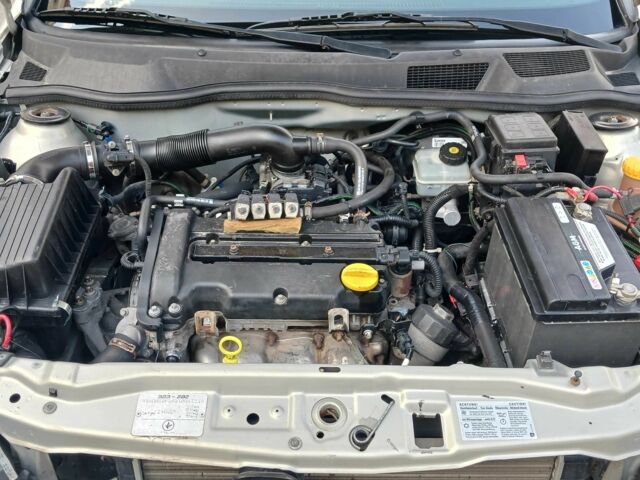 Серый Опель Астра, объемом двигателя 1.4 л и пробегом 260 тыс. км за 3590 $, фото 19 на Automoto.ua