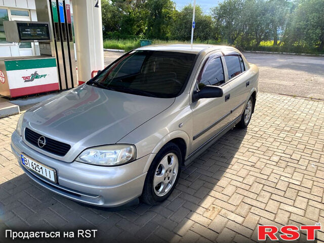 Серый Опель Астра, объемом двигателя 1.4 л и пробегом 200 тыс. км за 3500 $, фото 2 на Automoto.ua